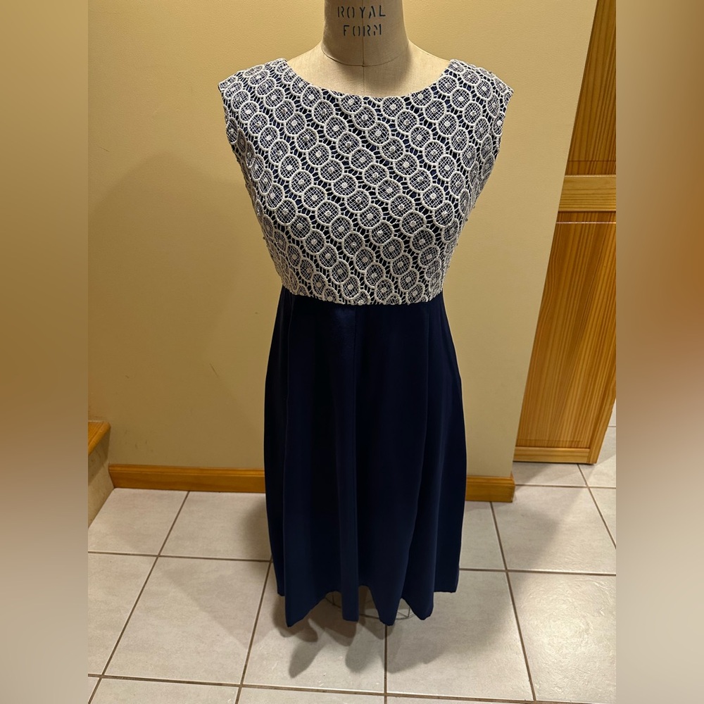 Navy blue women’s midi dress, with silver lace